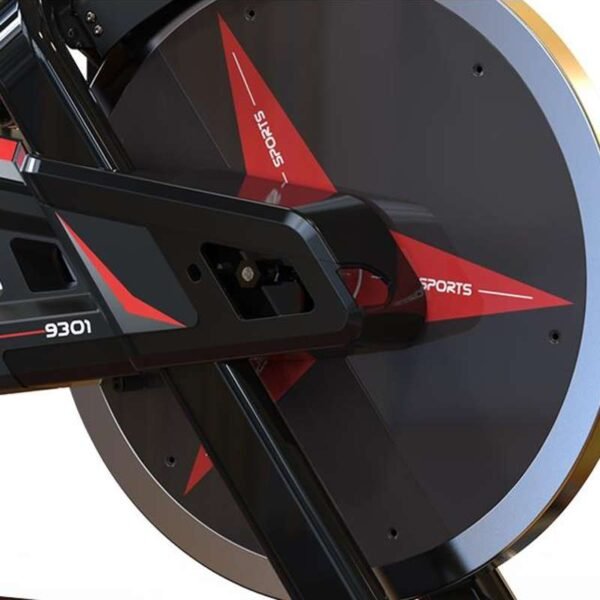 Close-up of an exercise bike flywheel with 'SPORTS 9301' branding