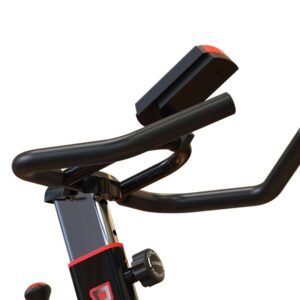 A well-lit modern office desk with a laptop, coffee mug, and a notepad.