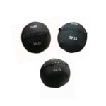 Three black medicine balls labeled 6KG, 8KG, and 9KG